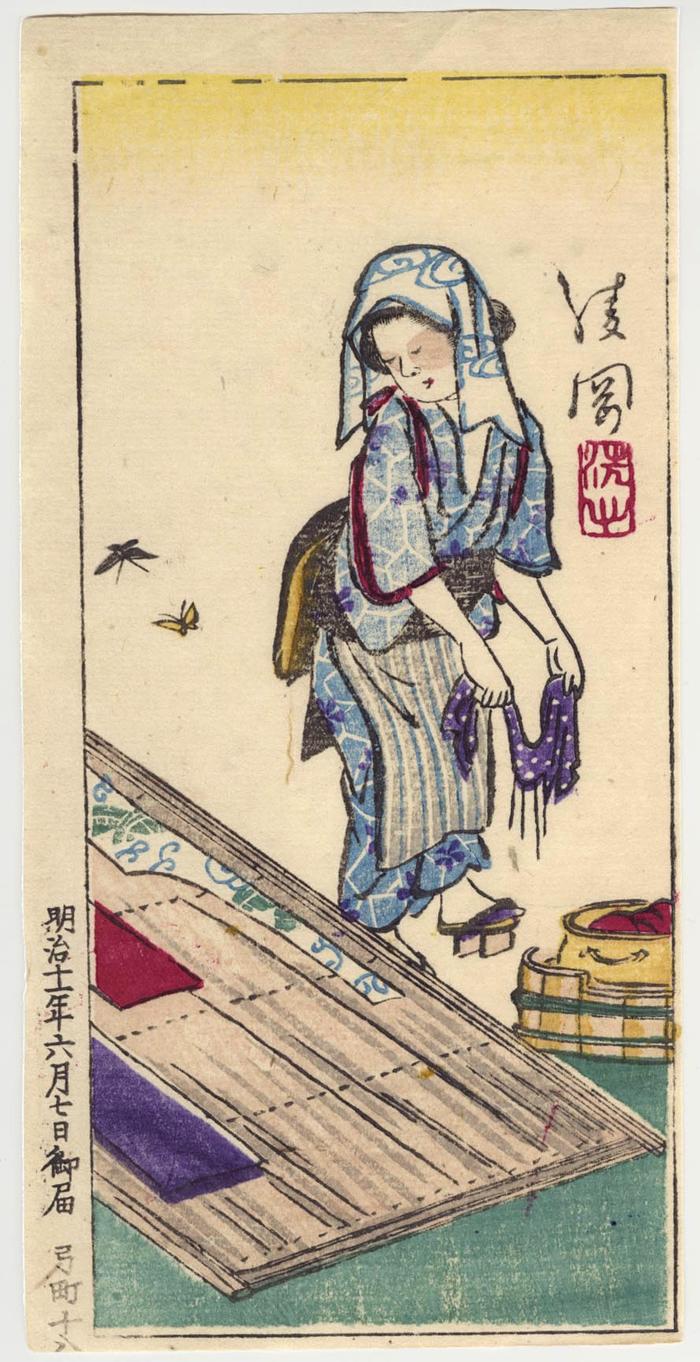 A woman washing and drying fabric 