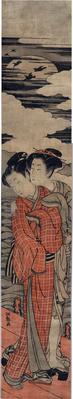 Lovers standing on a pier embracing in the moonlight