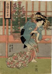Oiran sitting on a ledge by a lattice work